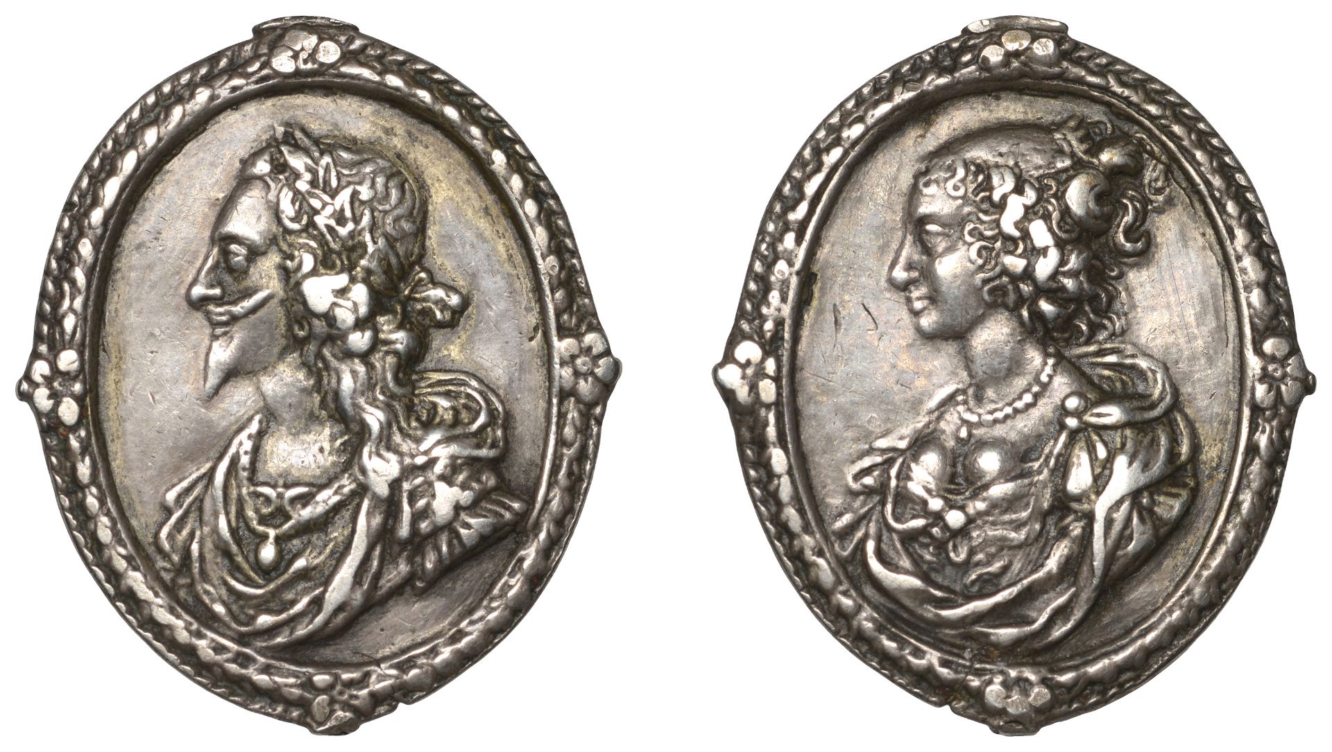 Charles I and Henrietta Maria, a cast silver Royalist badge, unsigned [by T. Rawlins], laure...