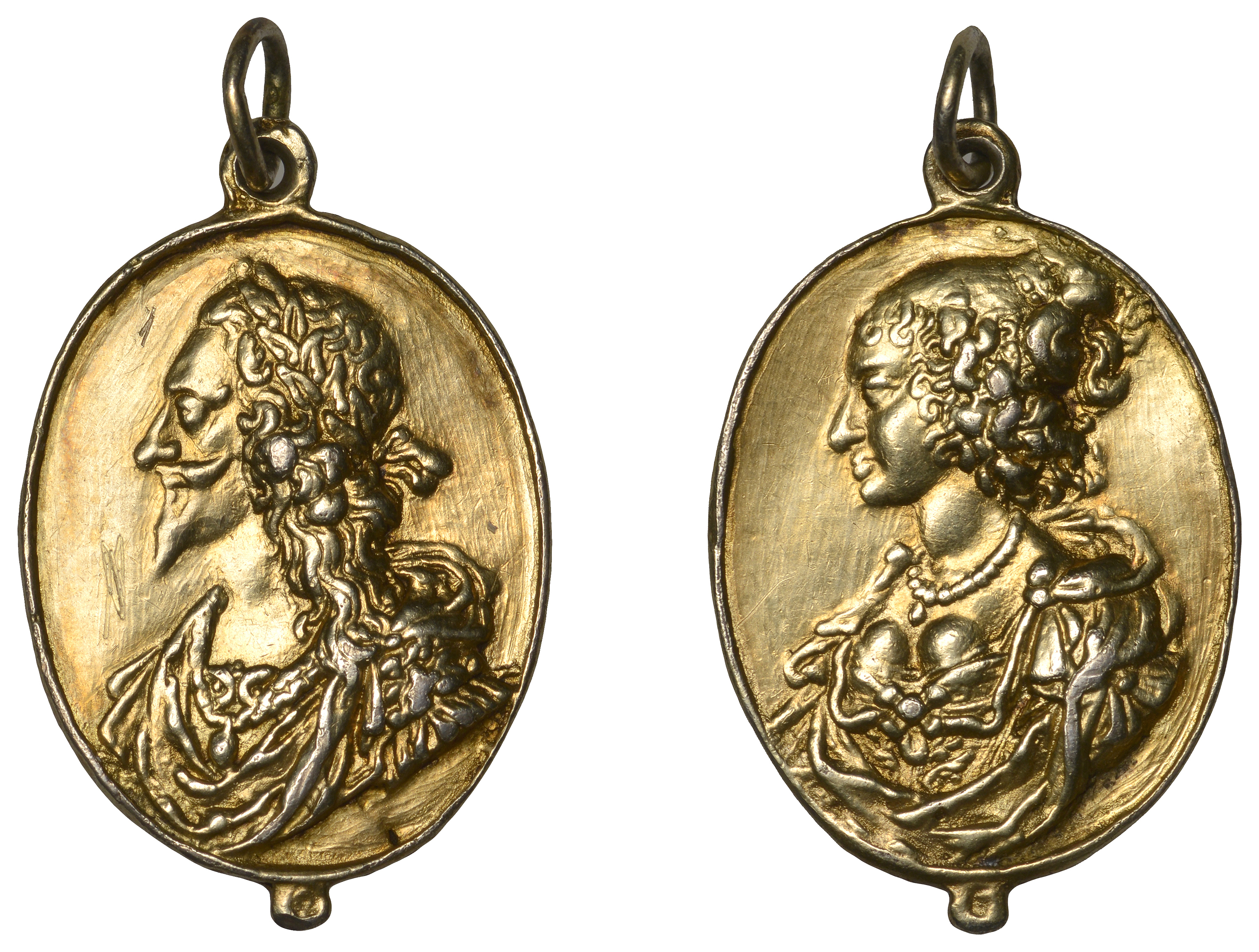 Charles I and Henrietta Maria, a cast and chased silver-gilt Royalist badge by T. Rawlins, l...