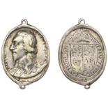 Charles I, a cast and chased silver Royalist badge by T. Rawlins, large bare-headed bust lef...