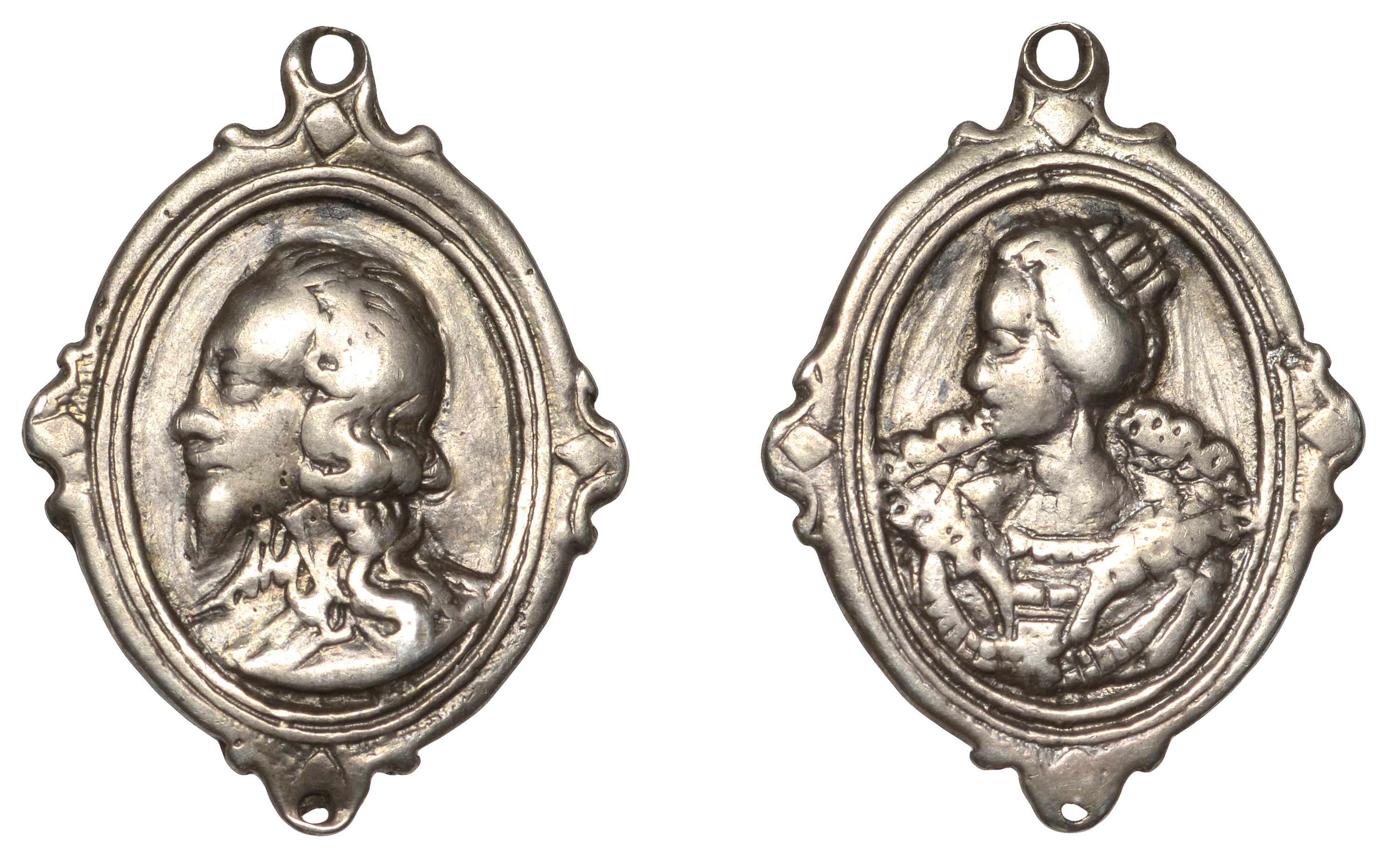 Charles I and Henrietta Maria, a cast and chased silver Royalist badge, unsigned, bare-heade...