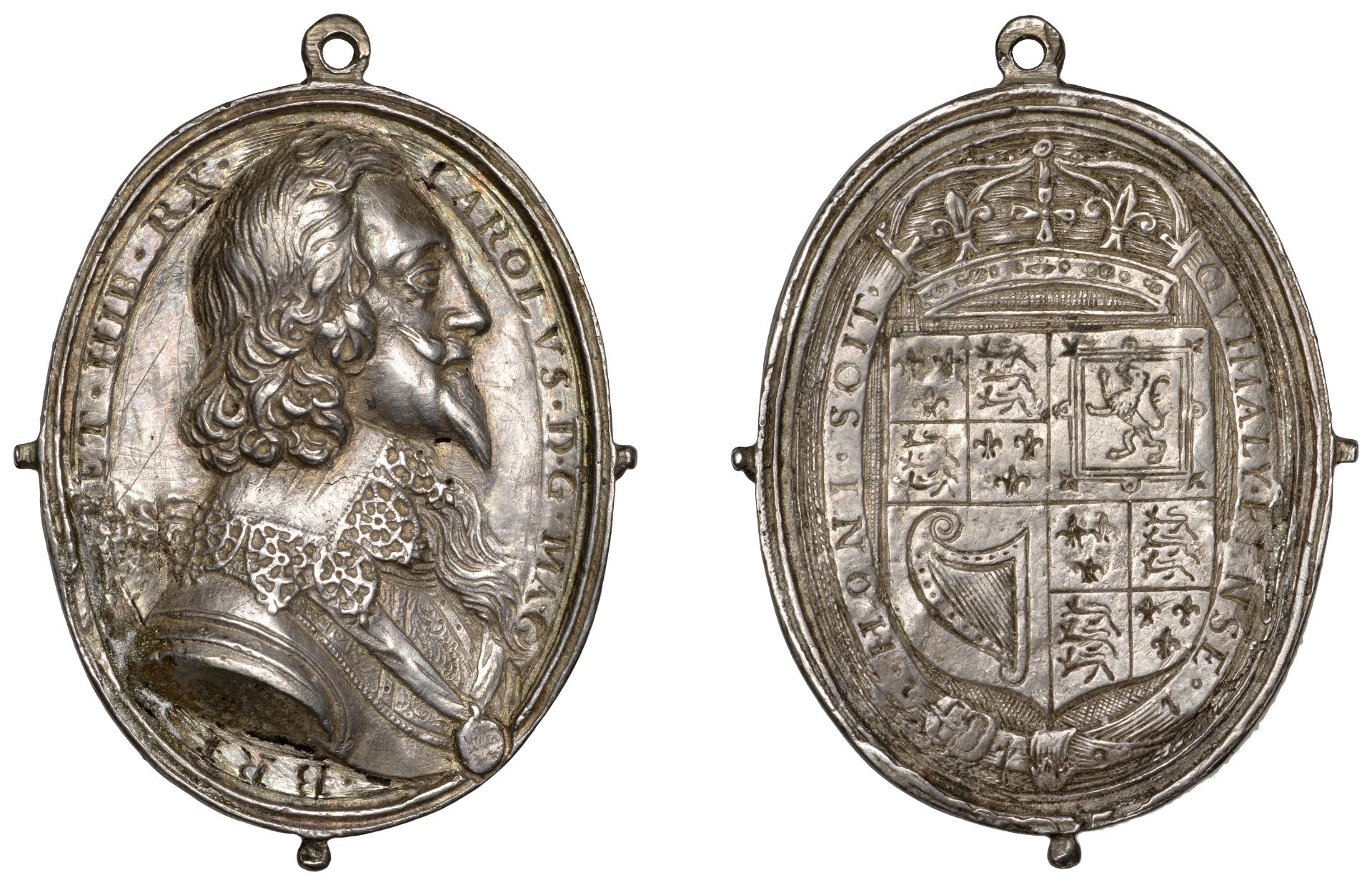 Charles I, a cast and chased silver Royalist badge, unsigned, similar to last, 39 x 30mm, 7....