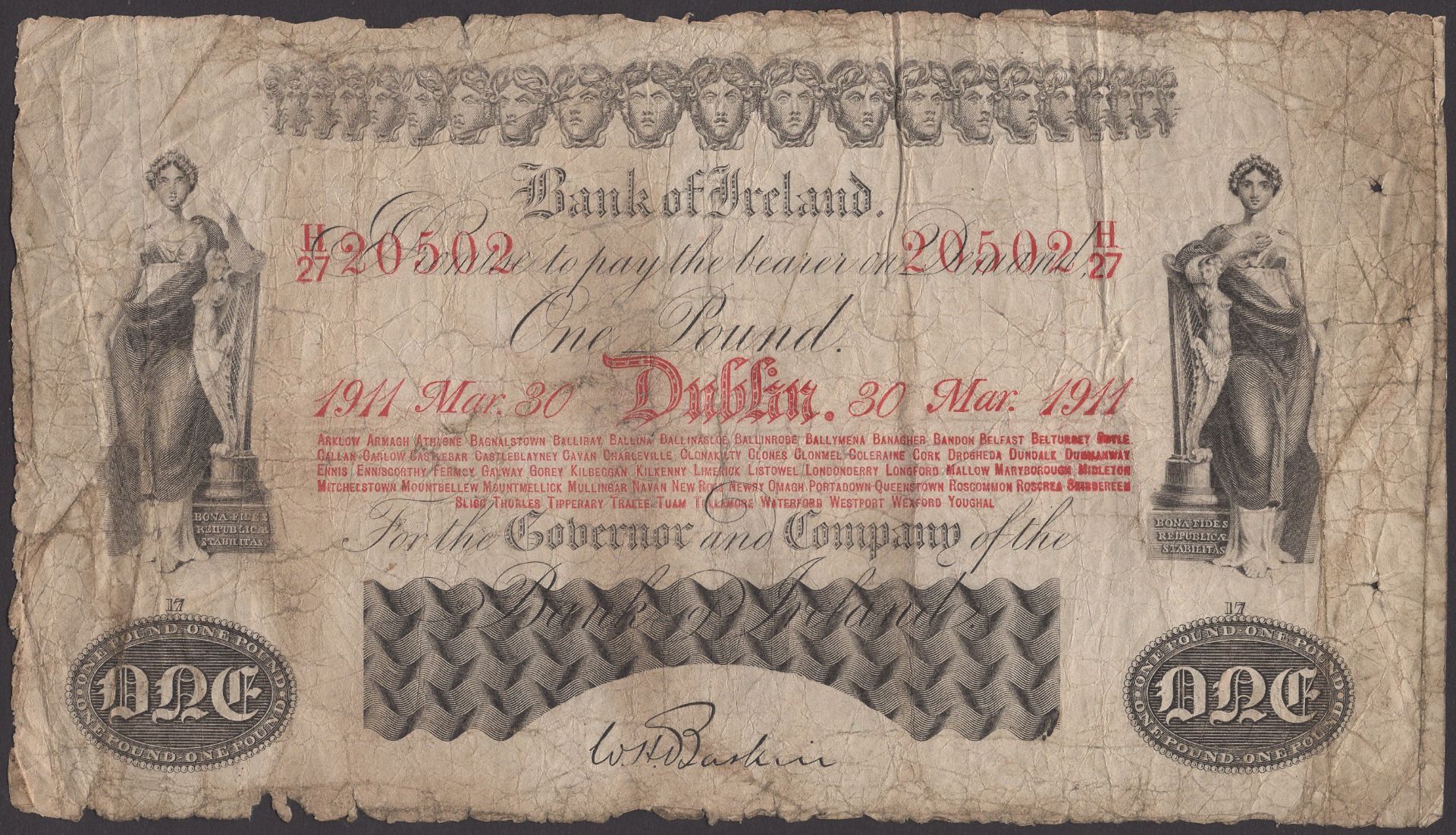 Bank of Ireland, Â£1, 30 March 1911, serial number H/27 20502, Baskin signature, spindle hole...