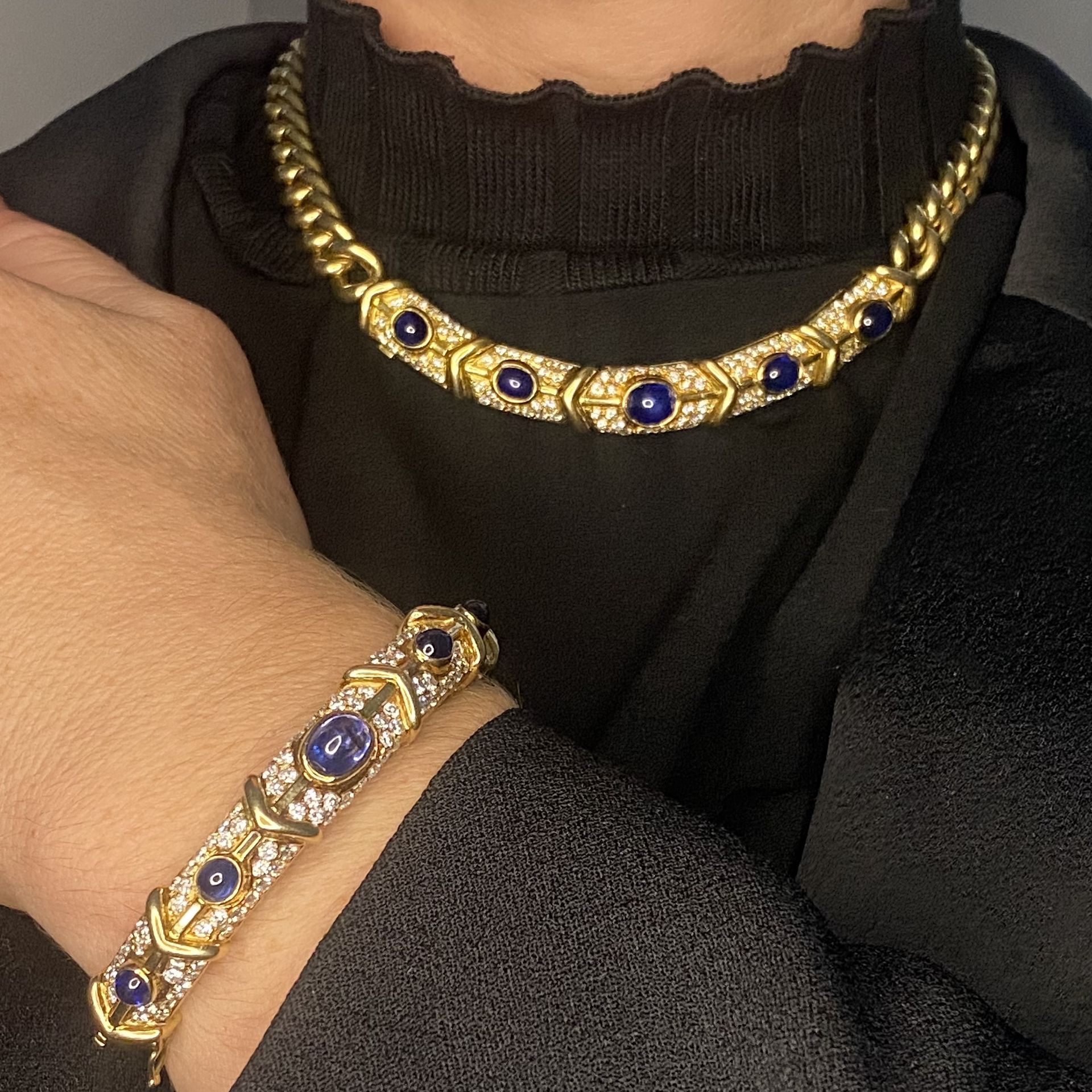 An 18ct gold sapphire and diamond collar necklace and bangle suite, the necklace composed of... - Image 4 of 4