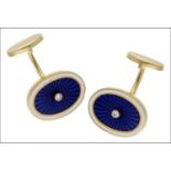 A pair of enamel and diamond cufflinks, the oval panels decorated with blue guillochÃ© enamel...