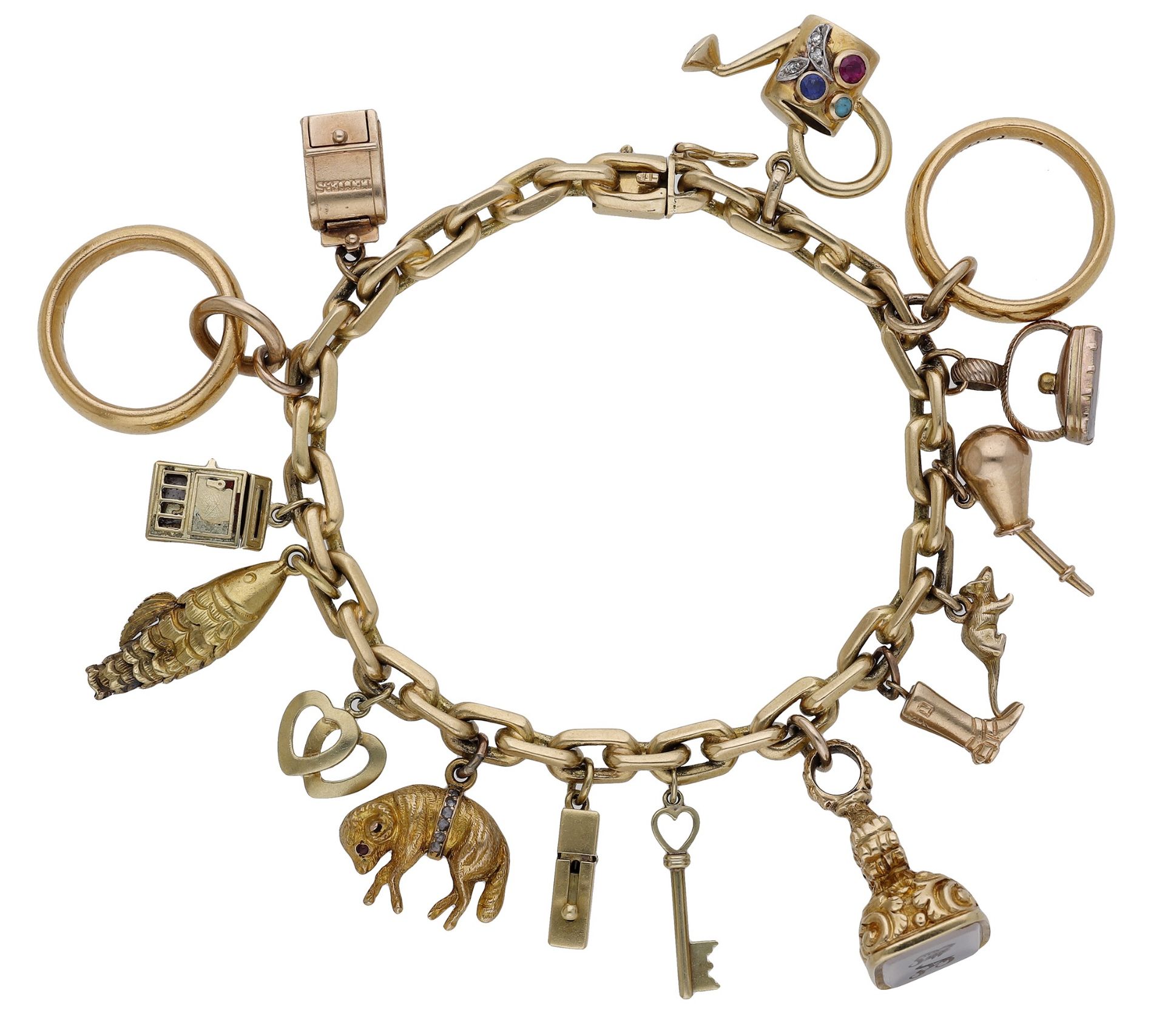 A charm bracelet, the faceted cable-link chain suspending various charms to include two 22ct...