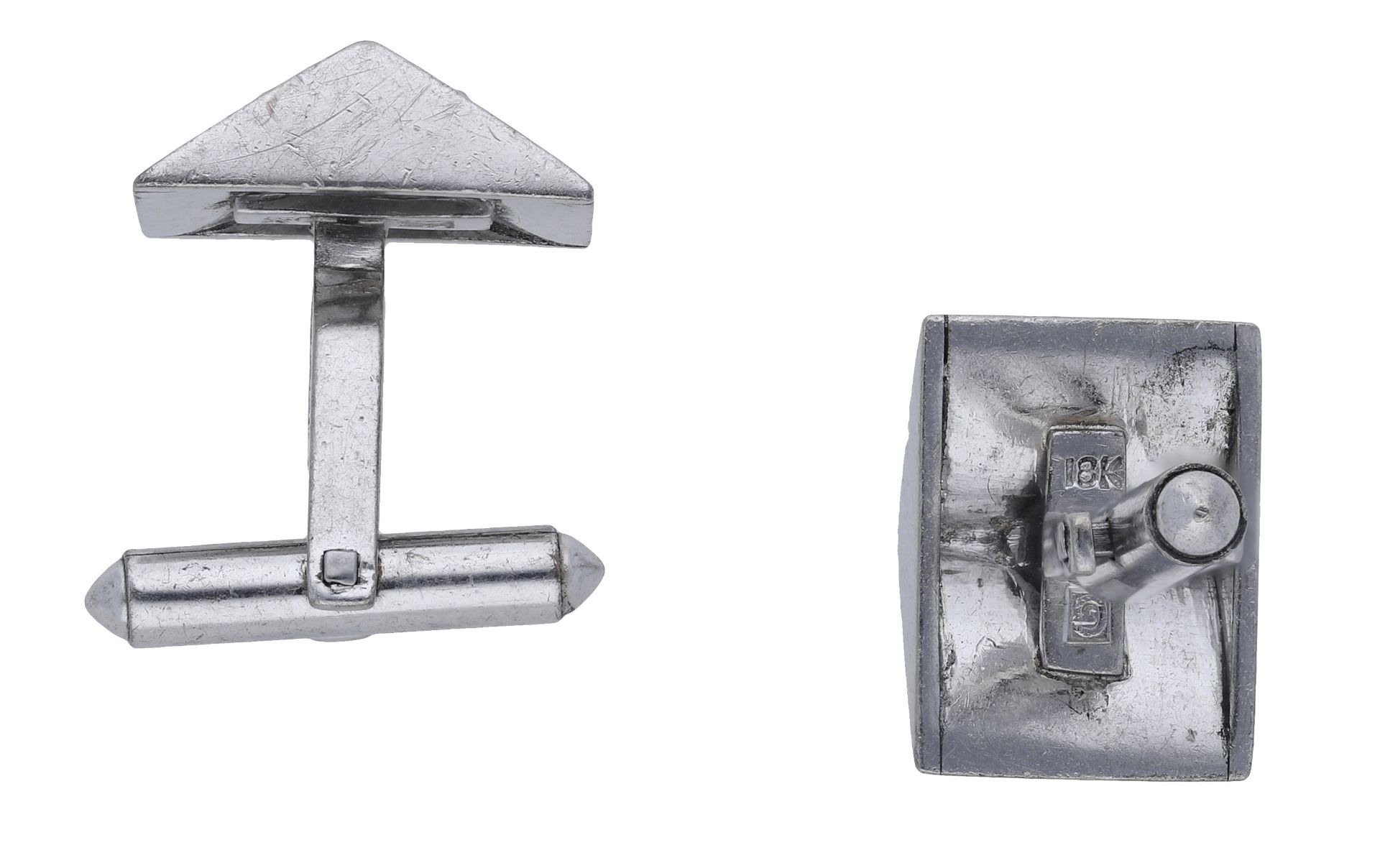 A pair of diamond cufflinks, the pyramidal plaques with a brushed satin finish, the central... - Image 2 of 3