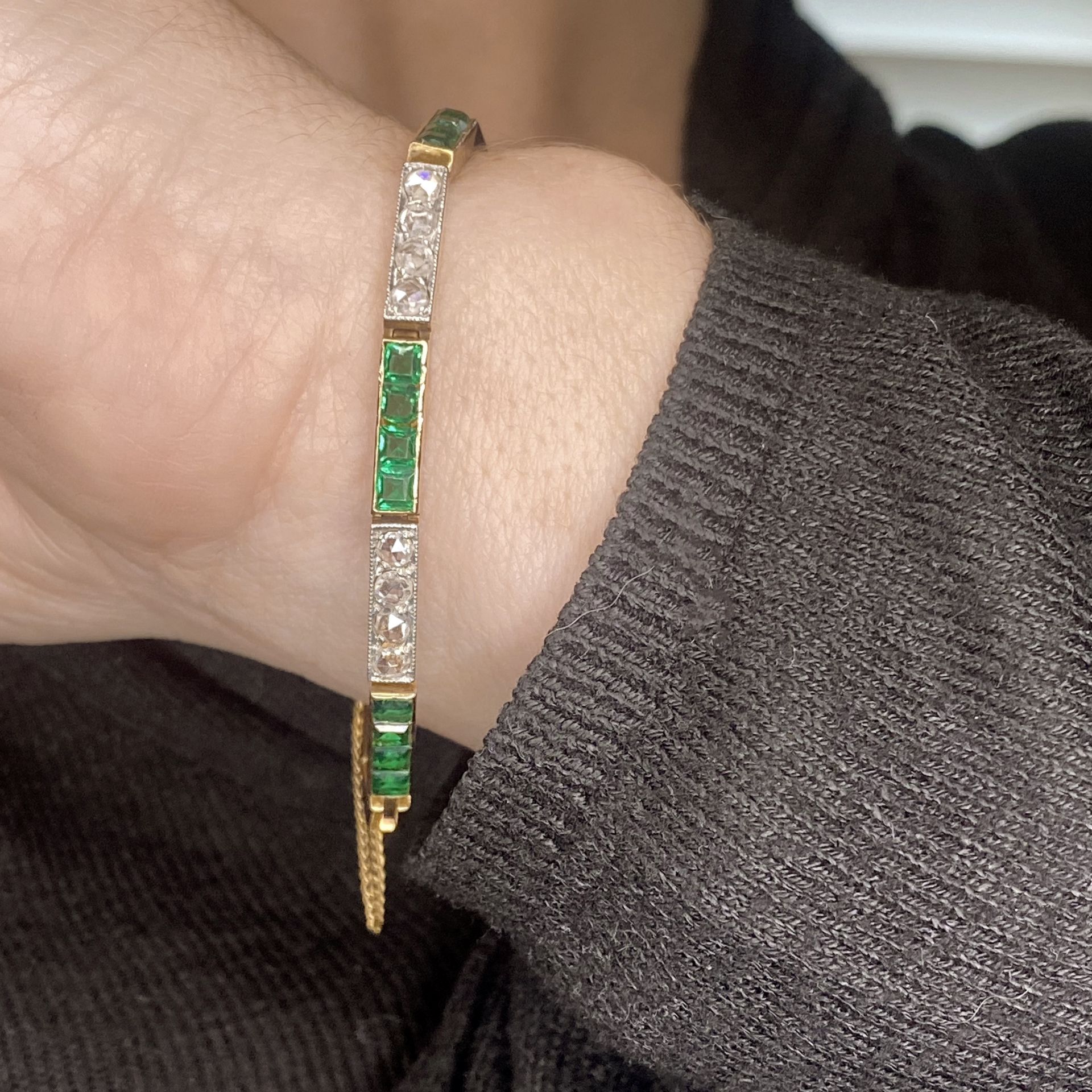 A diamond bracelet, set with alternating panels of rose-cut diamonds and step-cut green past... - Image 3 of 3