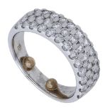 An 18ct white gold half hoop diamond ring, the tapered band pavÃ© set to the front with brill...