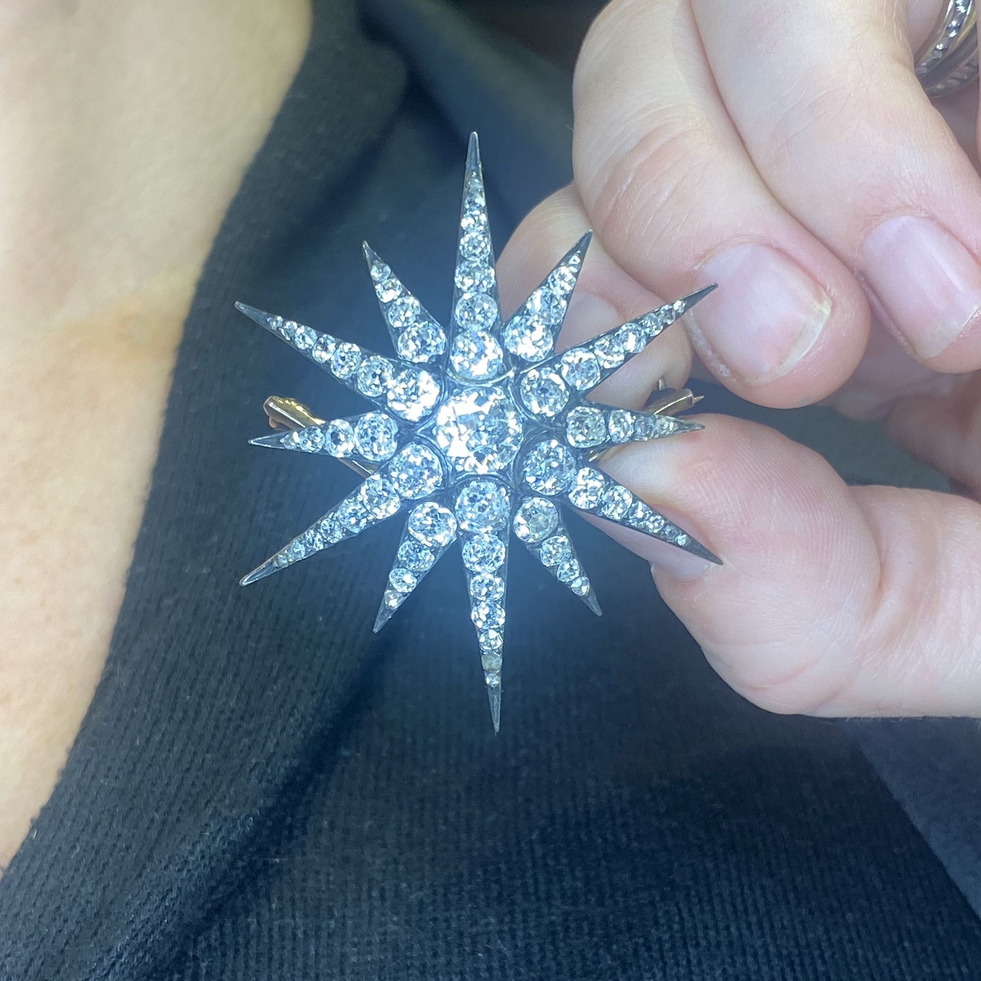 A diamond star brooch / pendant, circa 1890, set throughout with old brilliant and rose-cut... - Image 3 of 3