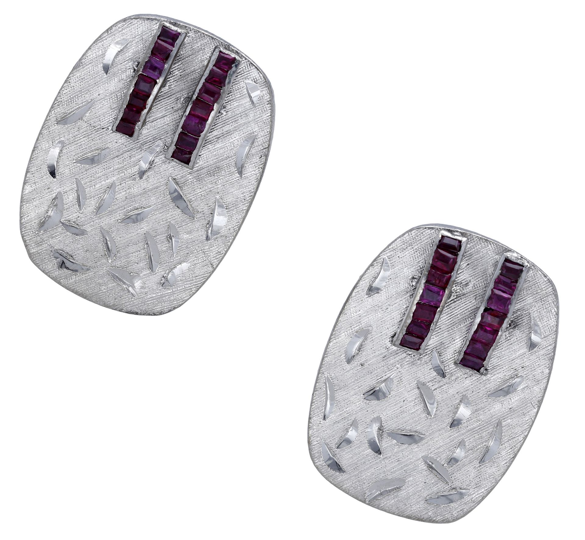 A pair of ruby cufflinks, the cushion-shaped plaques with brushed satin finish decorated wit...