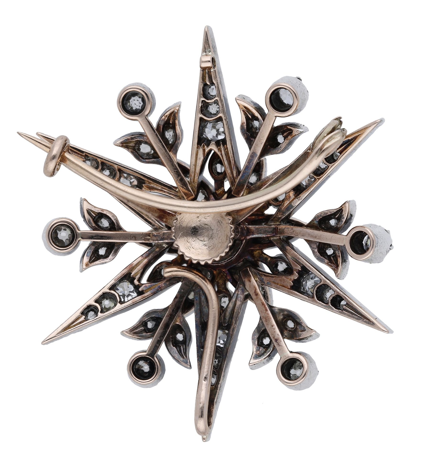 A diamond star brooch, circa 1890, the stylised star with flowerhead and foliate detailing,... - Image 2 of 3