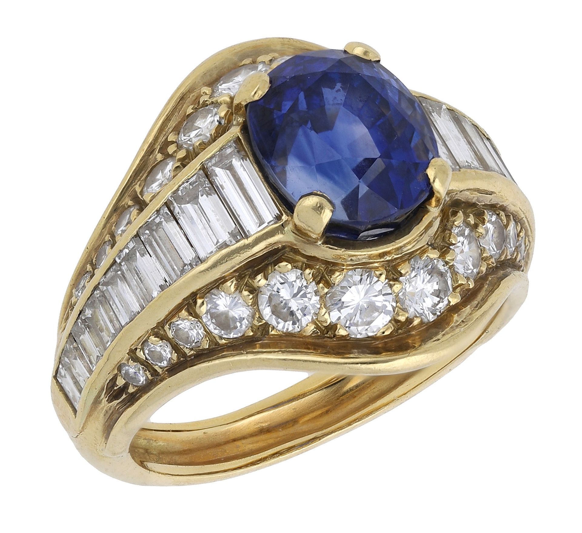 A sapphire and diamond dress ring, the bombÃ© style mount vari-set with a graduated brilliant...