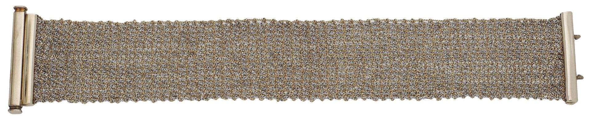 A 9ct gold bracelet, the bicoloured strap of woven mesh design, UK hallmark, length 18.5cm....