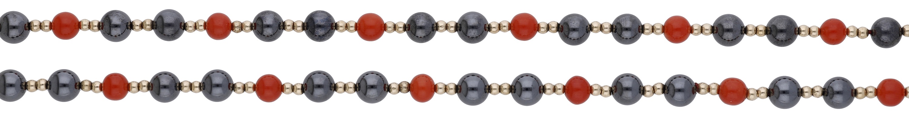 A hematite and coral bead necklace, strung as a single-row of coral corallium rubrum and hem...