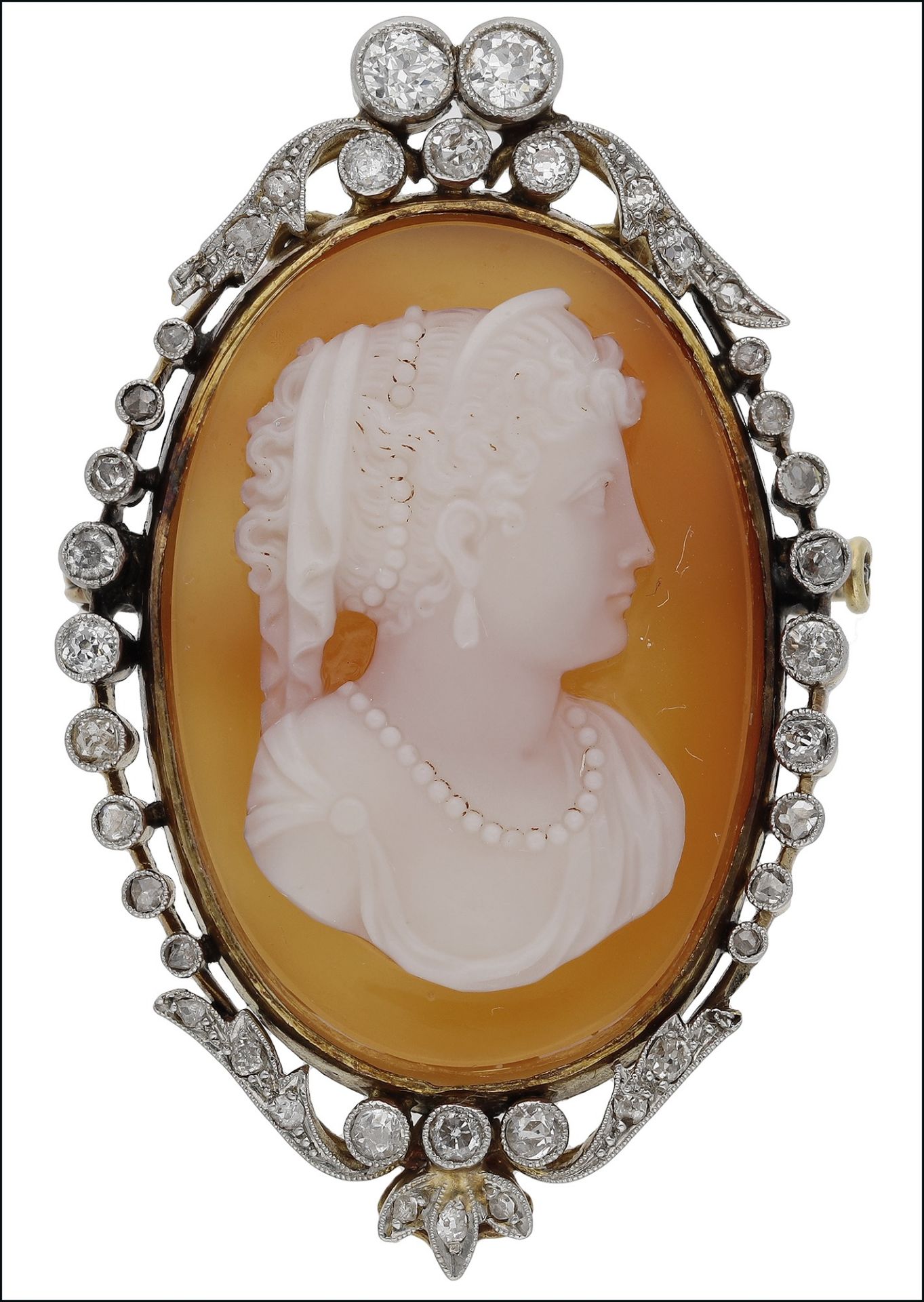 A late 19th century/early 20th century hardstone cameo and diamond brooch, carved to depict...