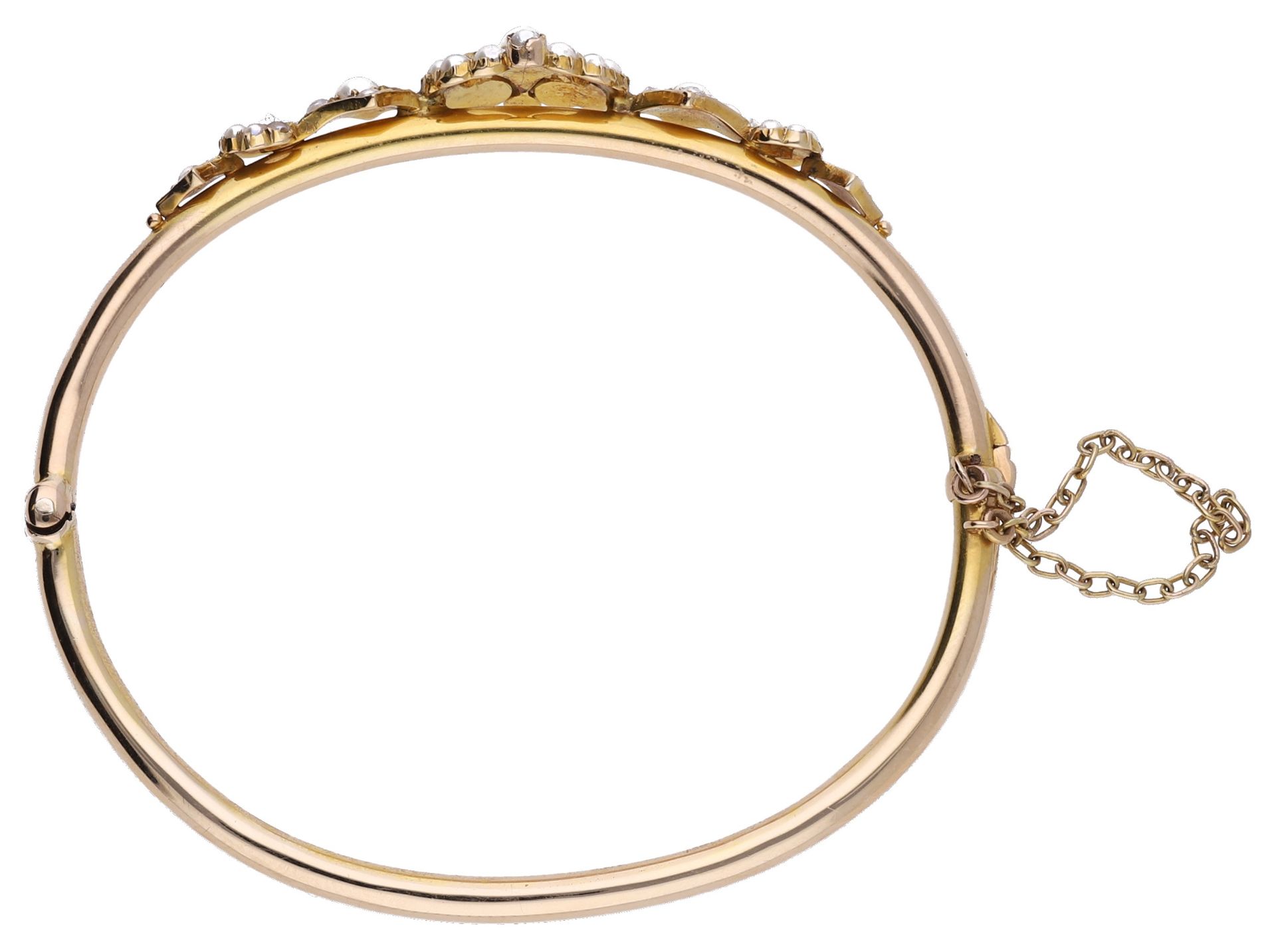 A gold and pearl bangle, circa 1900, the hinged bangle set to the front with openwork seed p... - Image 3 of 4