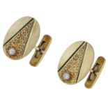A pair of diamond cufflinks, the oval plaques with brushed satin finish, central textured se...