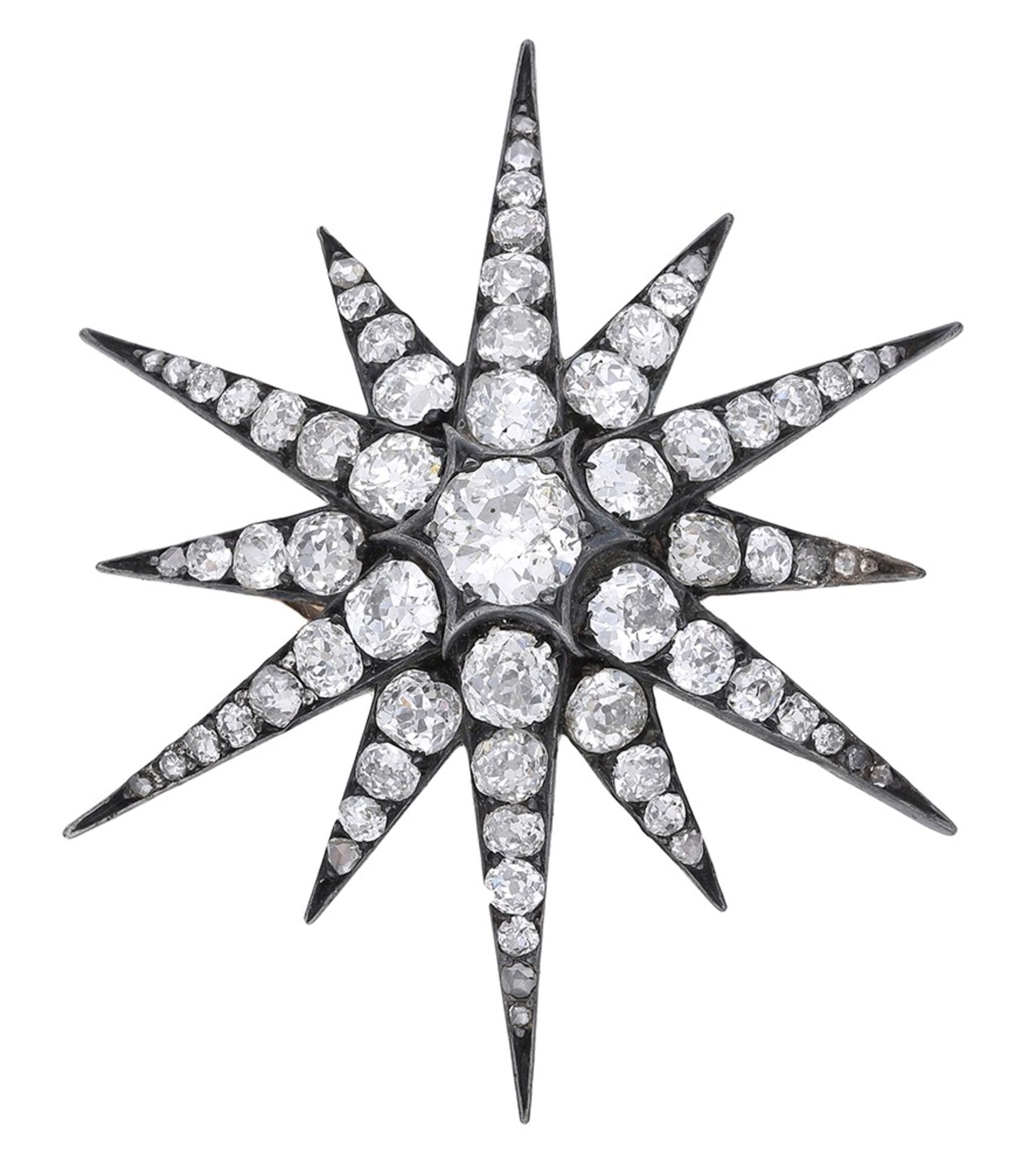 A diamond star brooch / pendant, circa 1890, set throughout with old brilliant and rose-cut...