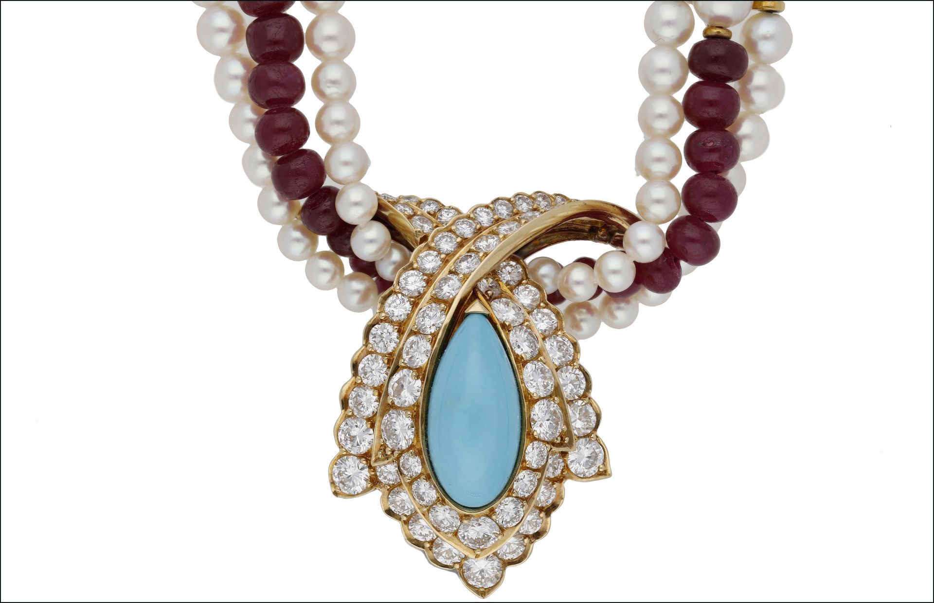 A French gem-set combination necklace, circa 1970, the triple strand of polished ruby beads... - Image 5 of 6