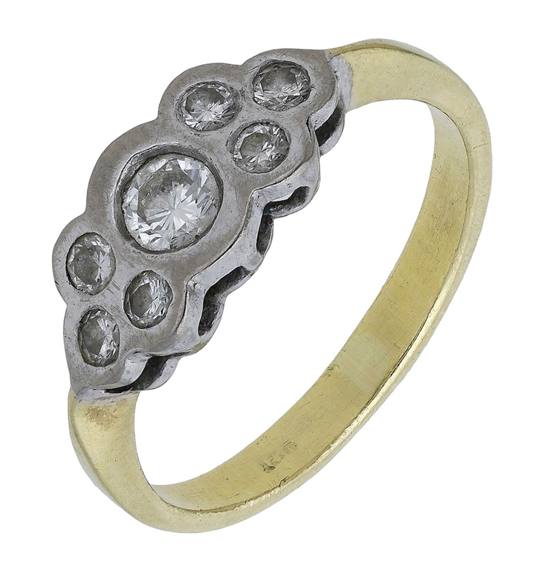 A bicolour diamond ring, bezel-set to the front with brilliant-cut diamonds, total diamond w...