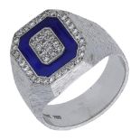 A lapis lazuli and diamond ring by Piaget, circa 1960, set with a cut-cornered rectangular c...