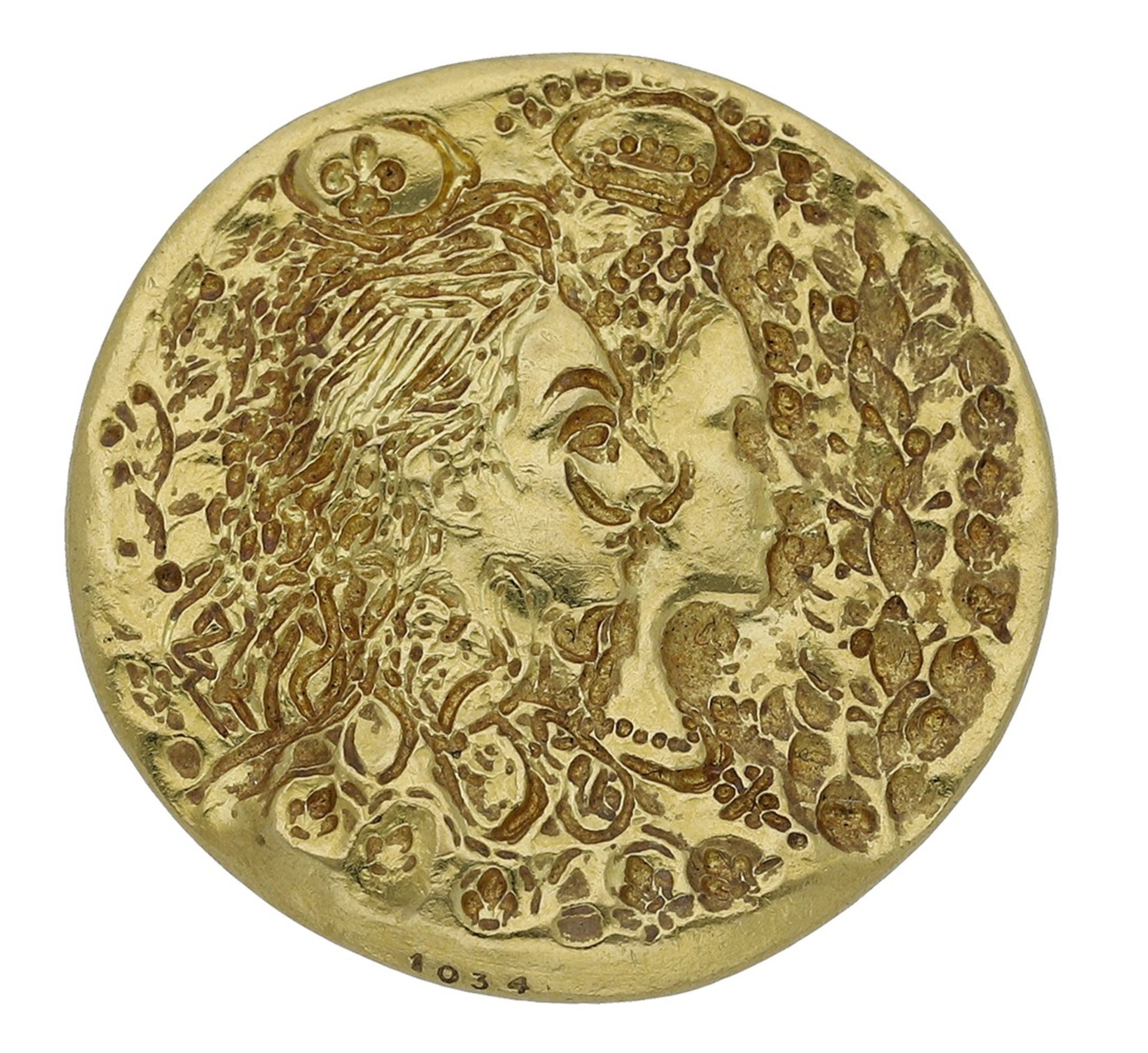 A 'Dali d'Or' ear clip by Salvador Dali for Piaget, the circular 'Dali d'or' coin depicting...