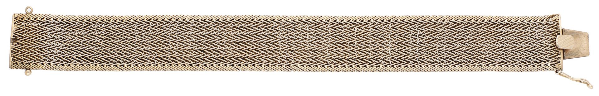 A fancy-link bracelet, designed as a woven herringbone strap, stamped '18K', length 18cm. Â£...