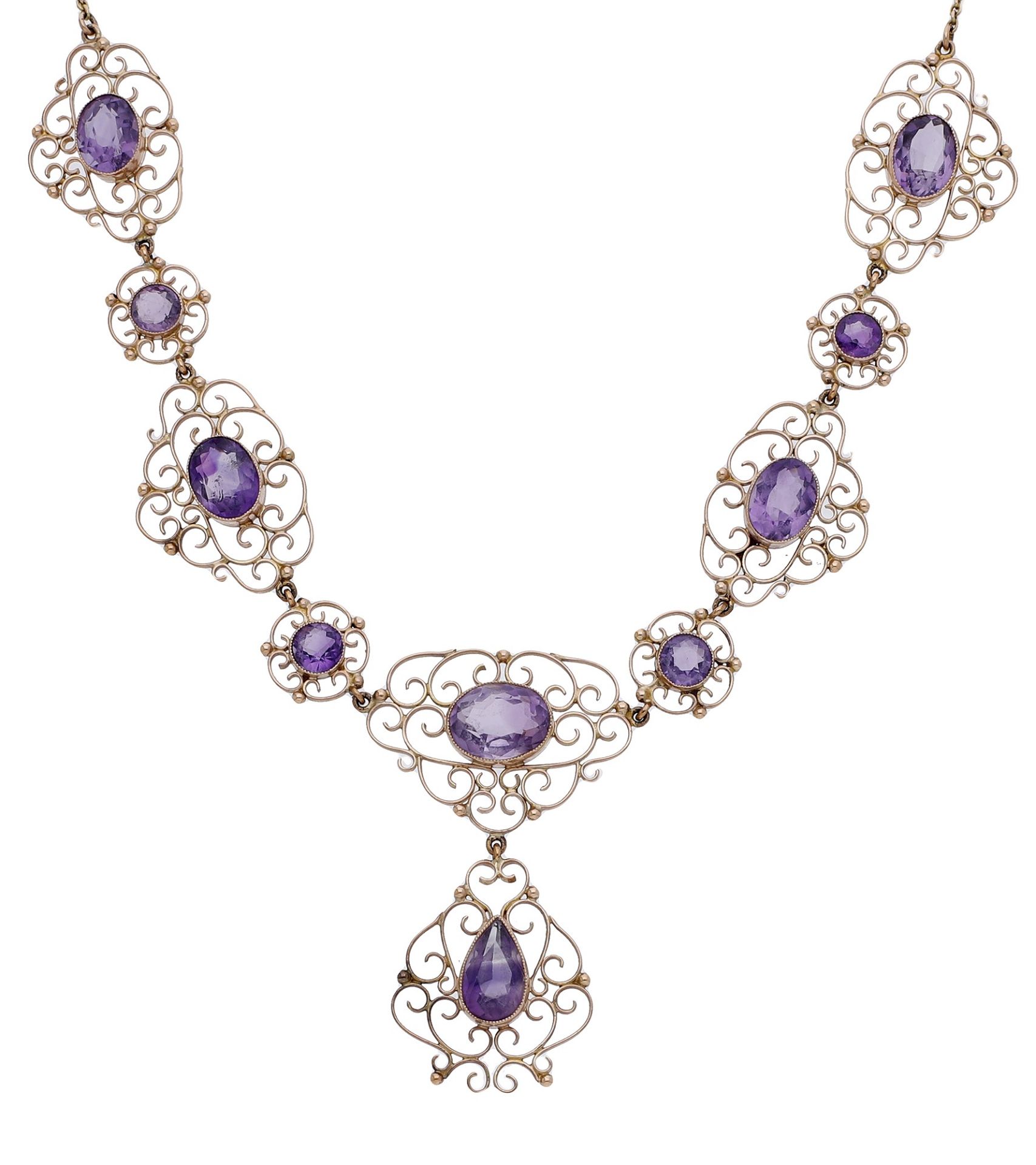 A late 19th century amethyst necklace, the cable-link chain leading to a graduated series of...