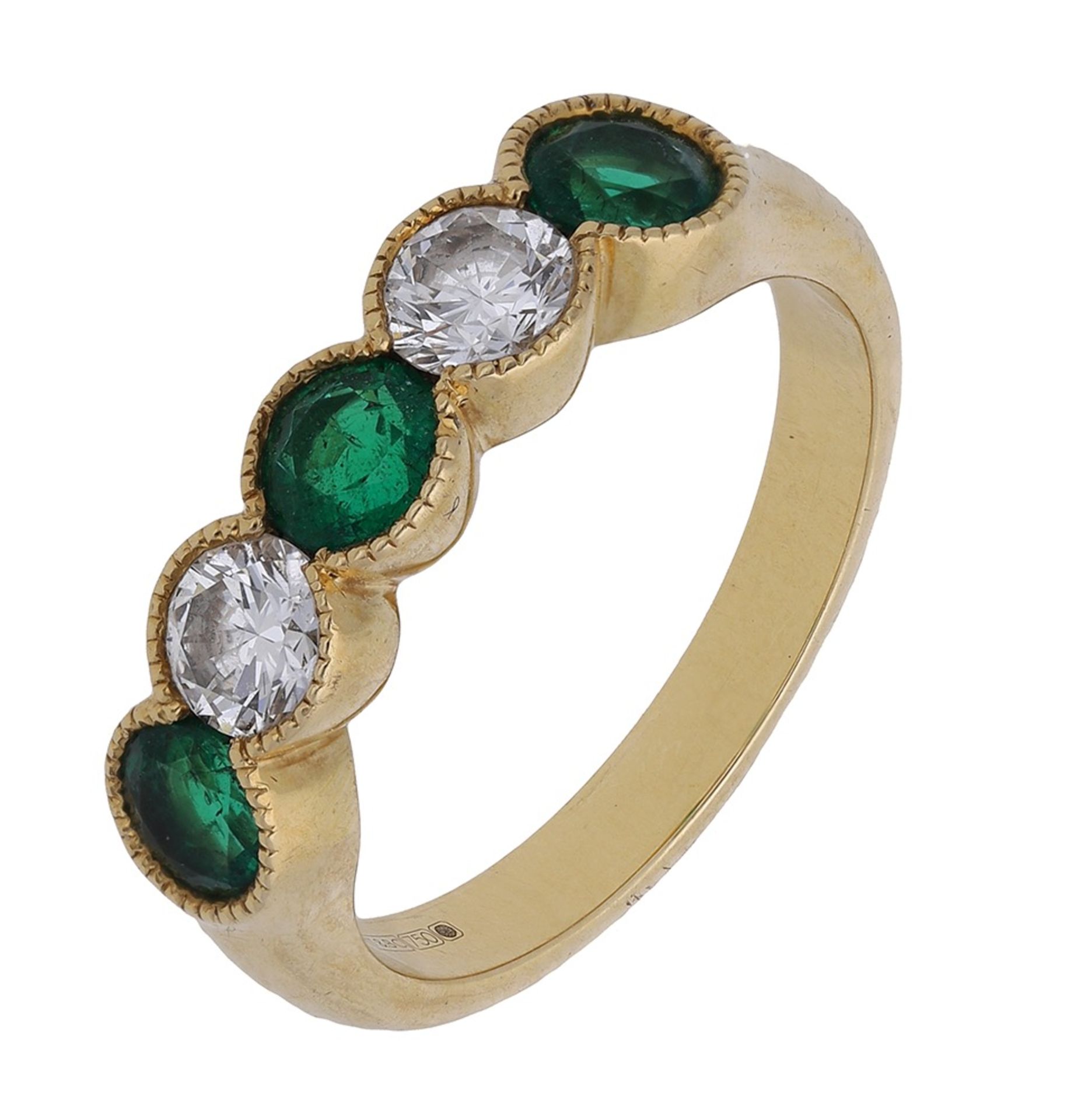 An 18ct gold emerald and diamond five stone ring, alternately set with circular-cut emeralds...