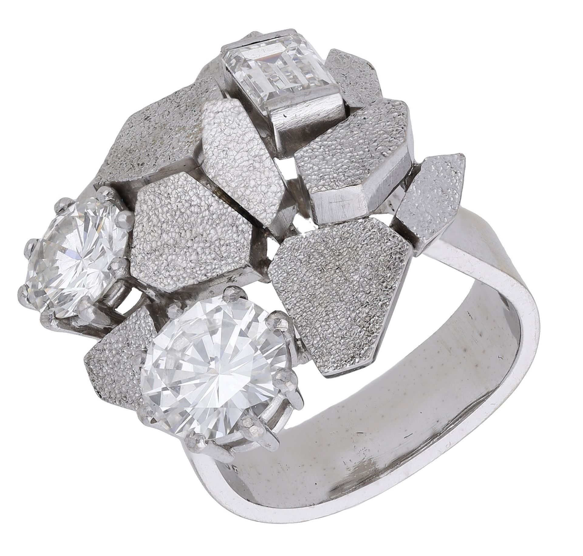 A diamond ring by Andrew Grima, 1972, the textured matt gold 'paving stones' set with a step... - Image 2 of 9