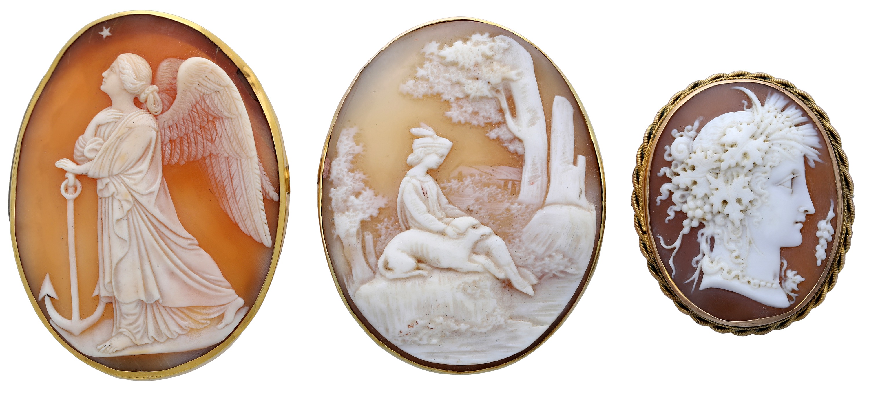 Three 19th century shell cameo brooches, to include an oval example carved to depict the Ang...