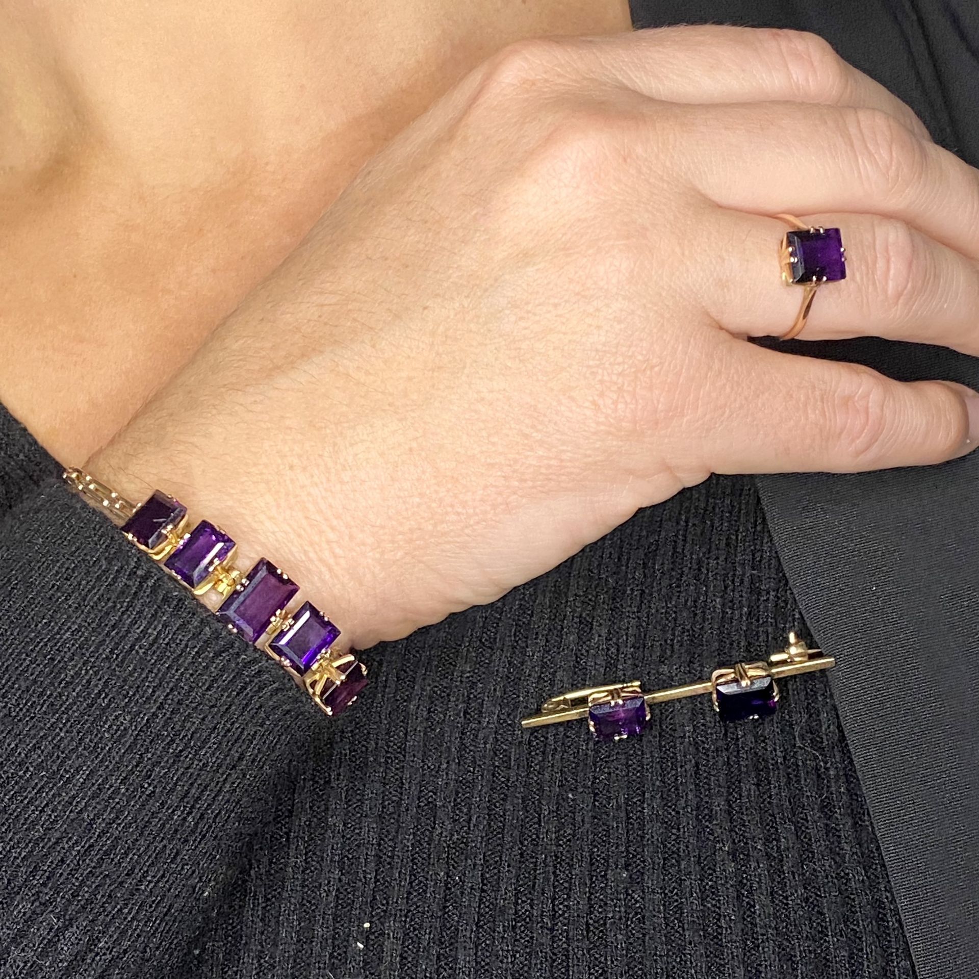 An amethyst bracelet, ring and brooch, the articulated bracelet set with a graduated row of... - Image 2 of 2