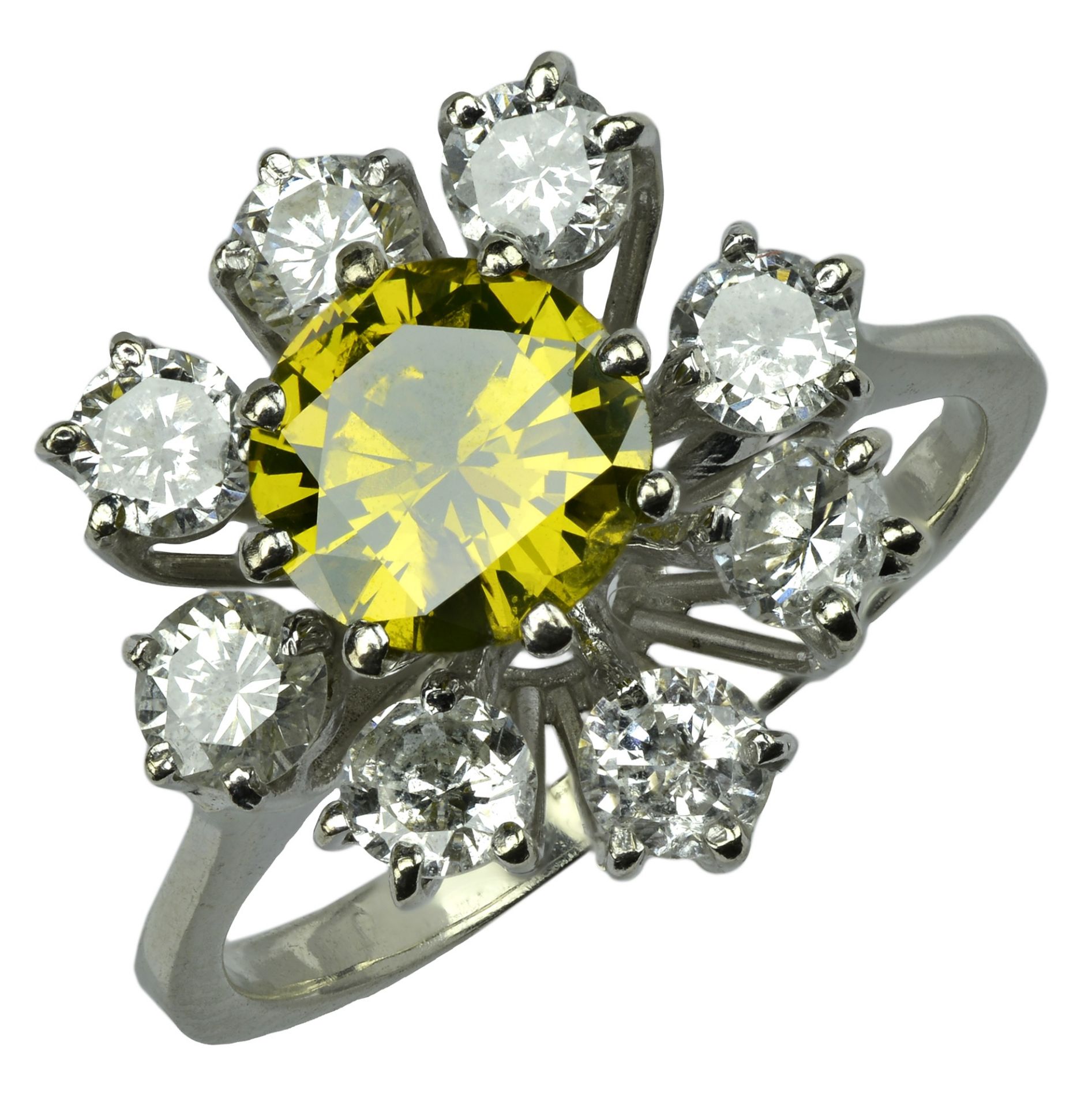 A diamond cluster ring, the central brilliant-cut diamond of yellow tint within an undulatin... - Image 2 of 5