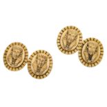 A pair of novelty cufflinks, the oval panels modelled as the mask of Tutankhamun, to figure-...