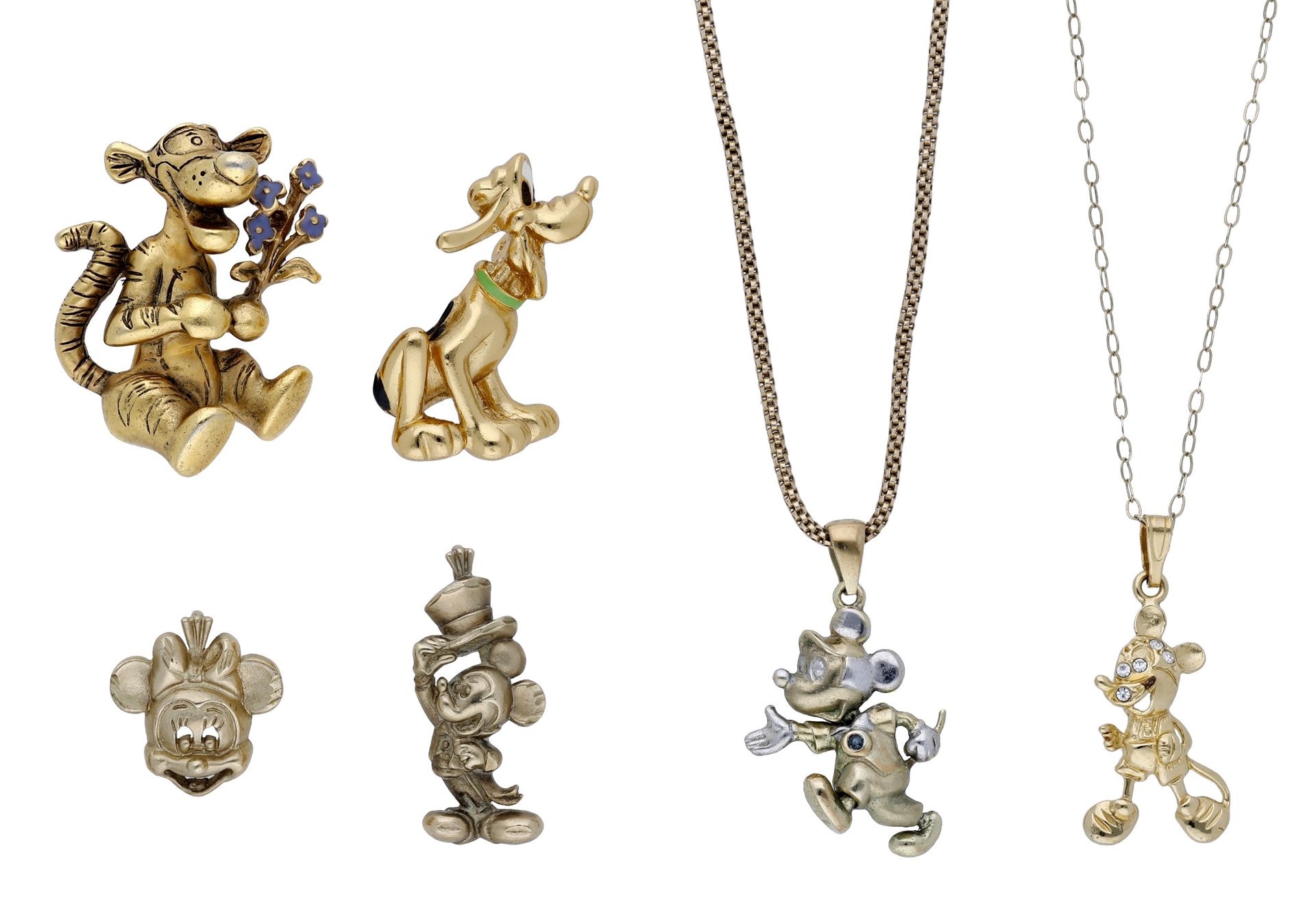 A small collection of Disney charms and pendants, including a bicolour 9ct gold articulated...