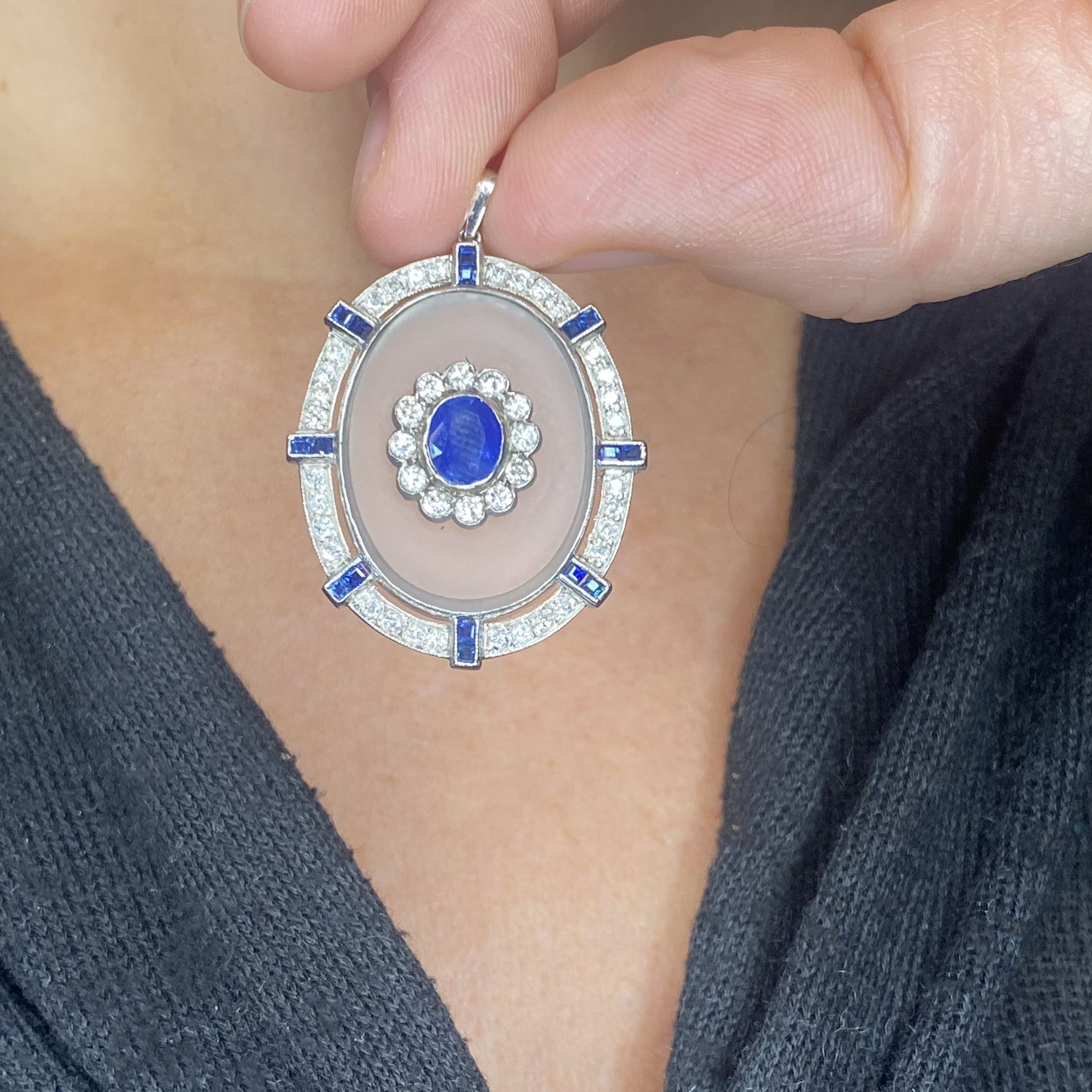 An Art Deco style gem-set pendant, the central sapphire and diamond cluster applied to a fro... - Image 3 of 3