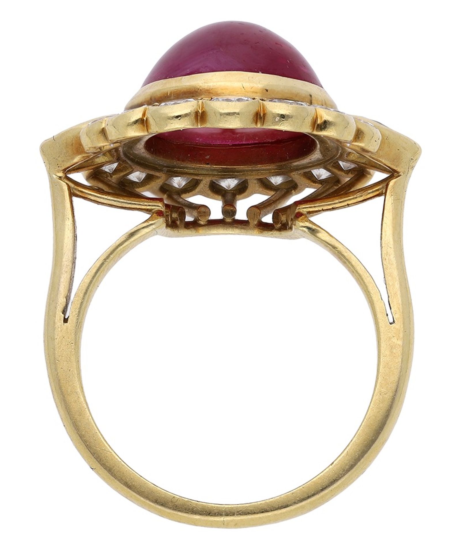 An 18ct gold cabochon ruby and diamond cluster ring, the ruby cabochon centred within a bril... - Image 2 of 3