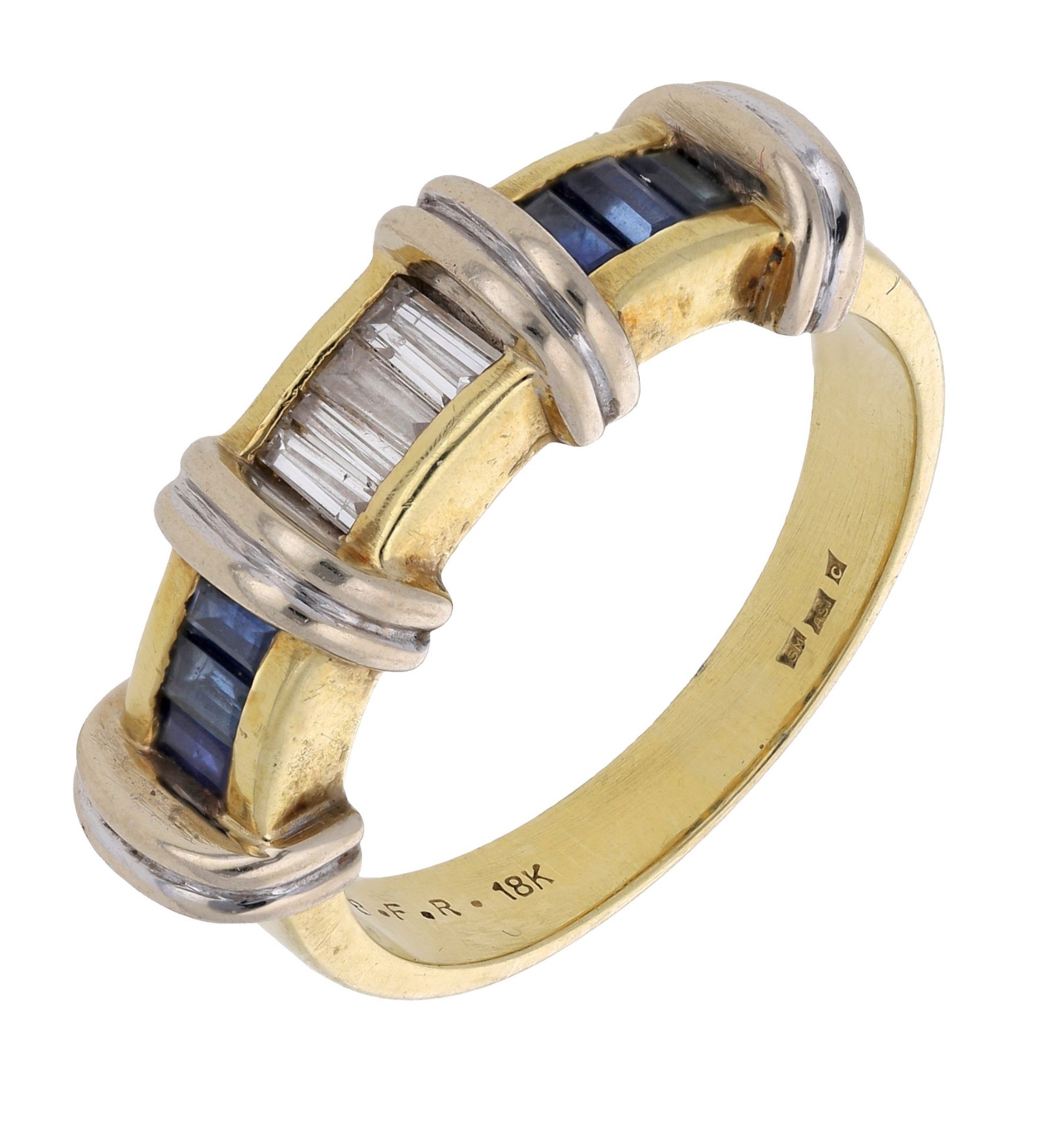 A sapphire and diamond ring, channel-set with calibrÃ©-cut sapphire and diamonds with reeded...