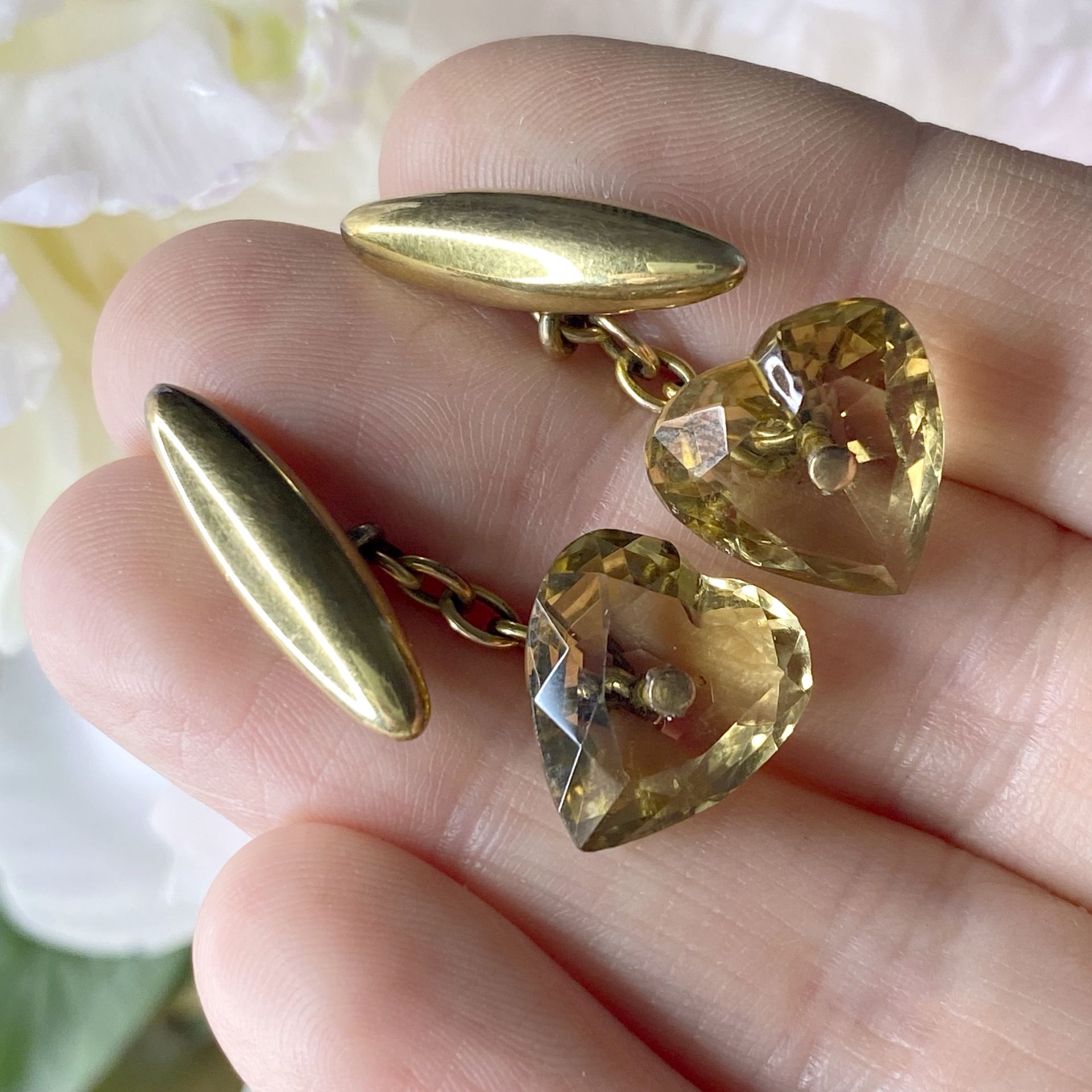 A pair of citrine cufflinks, the faceted heart-shaped citrines with hollow ovoid terminals,... - Image 3 of 3