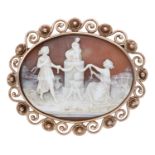 A late 19th/early 20th century shell cameo brooch/pendant, the oval cameo carved to depict v...