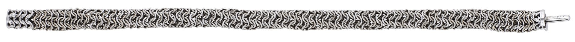 A fancy-link bracelet, the highly articulated strap of woven ropetwist design, stamped '750'...