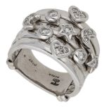 A 'Moon and Star' diamond dress ring by Adler, 2000, composed of five tapered bands, the fro...
