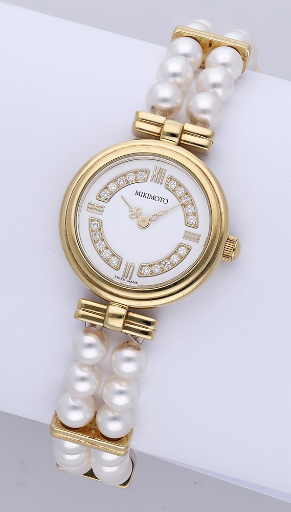 Mikimoto. A lady's gold and cultured pearl bracelet watch, circa 2000. Movement: quartz, 12...