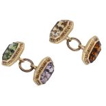 A pair of gem-set cufflinks, set with a combination of octagonal-cut peridot, amethyst and c...