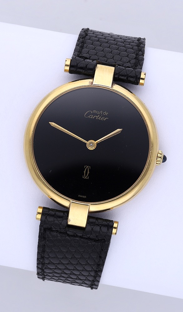 Must de Cartier. A lady's gold-plated wristwatch, circa 1990. Movement: quartz. Dial: blac...