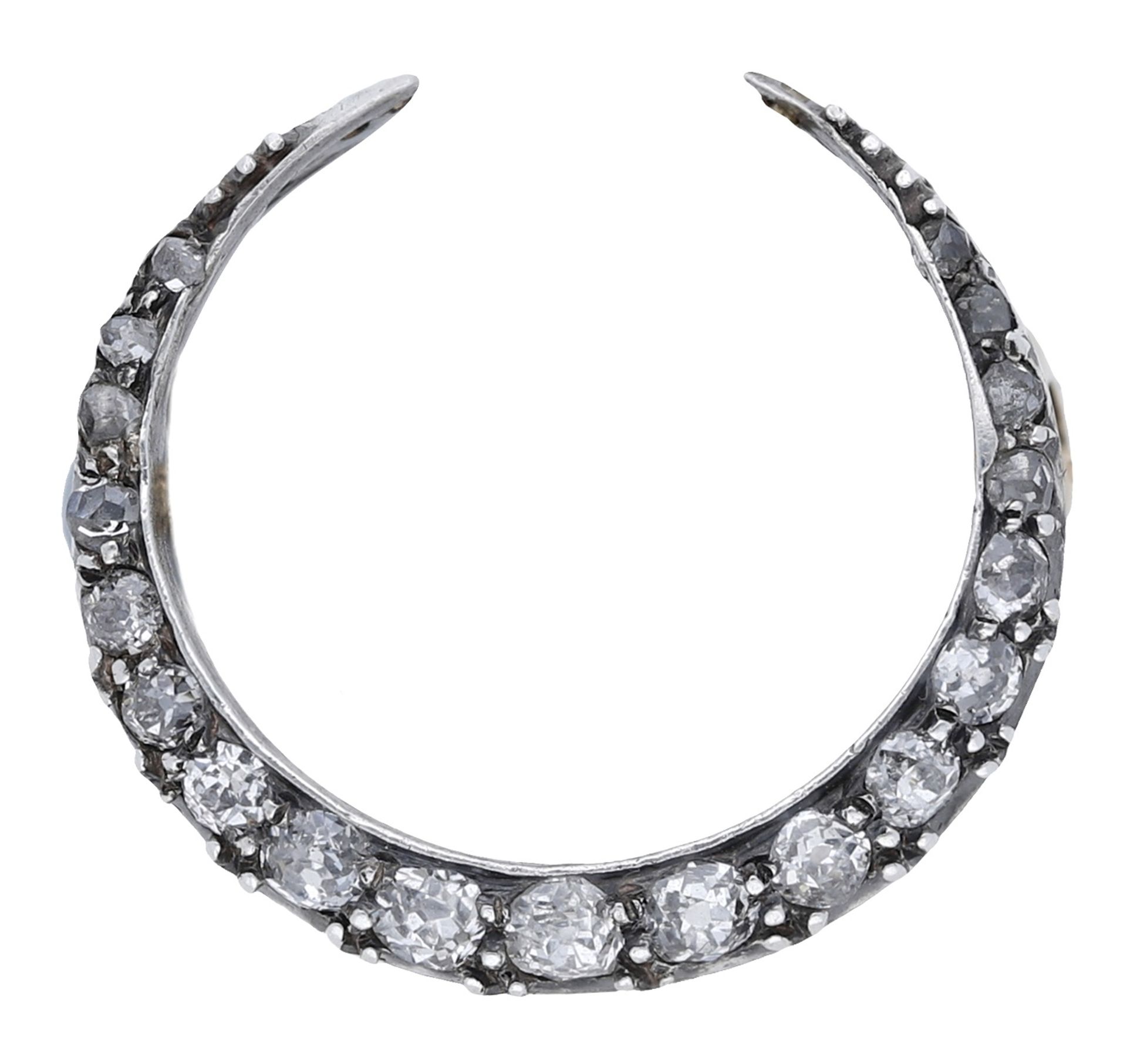 A diamond crescent brooch, circa 1890, set throughout with graduated old-cut diamonds, gold...