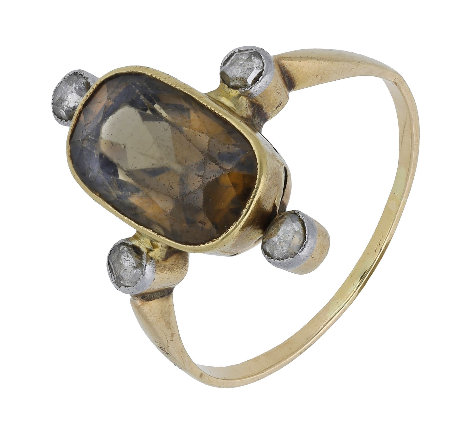 An early 20th century brown zircon and diamond ring, the oval mixed-cut brown zircon in a ru...