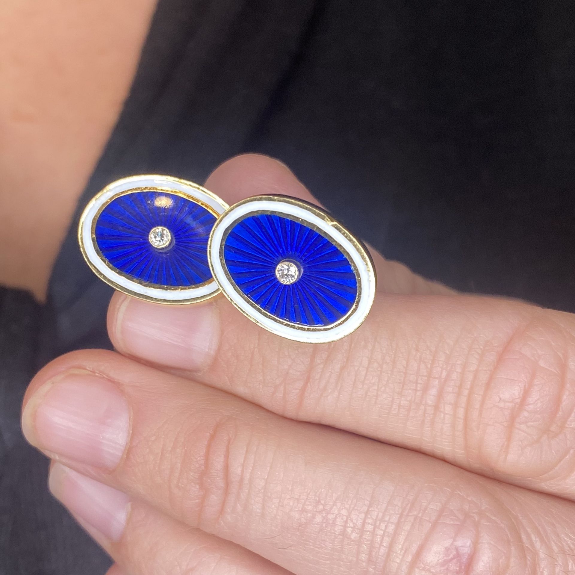 A pair of enamel and diamond cufflinks, the oval panels decorated with blue guillochÃ© enamel... - Image 4 of 4