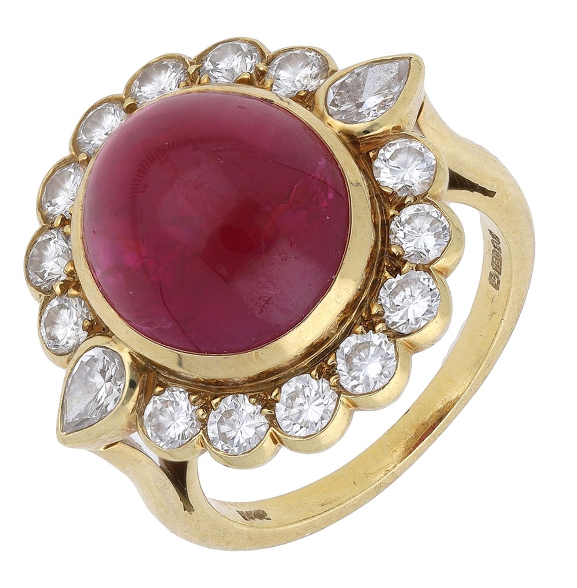 An 18ct gold cabochon ruby and diamond cluster ring, the ruby cabochon centred within a bril...