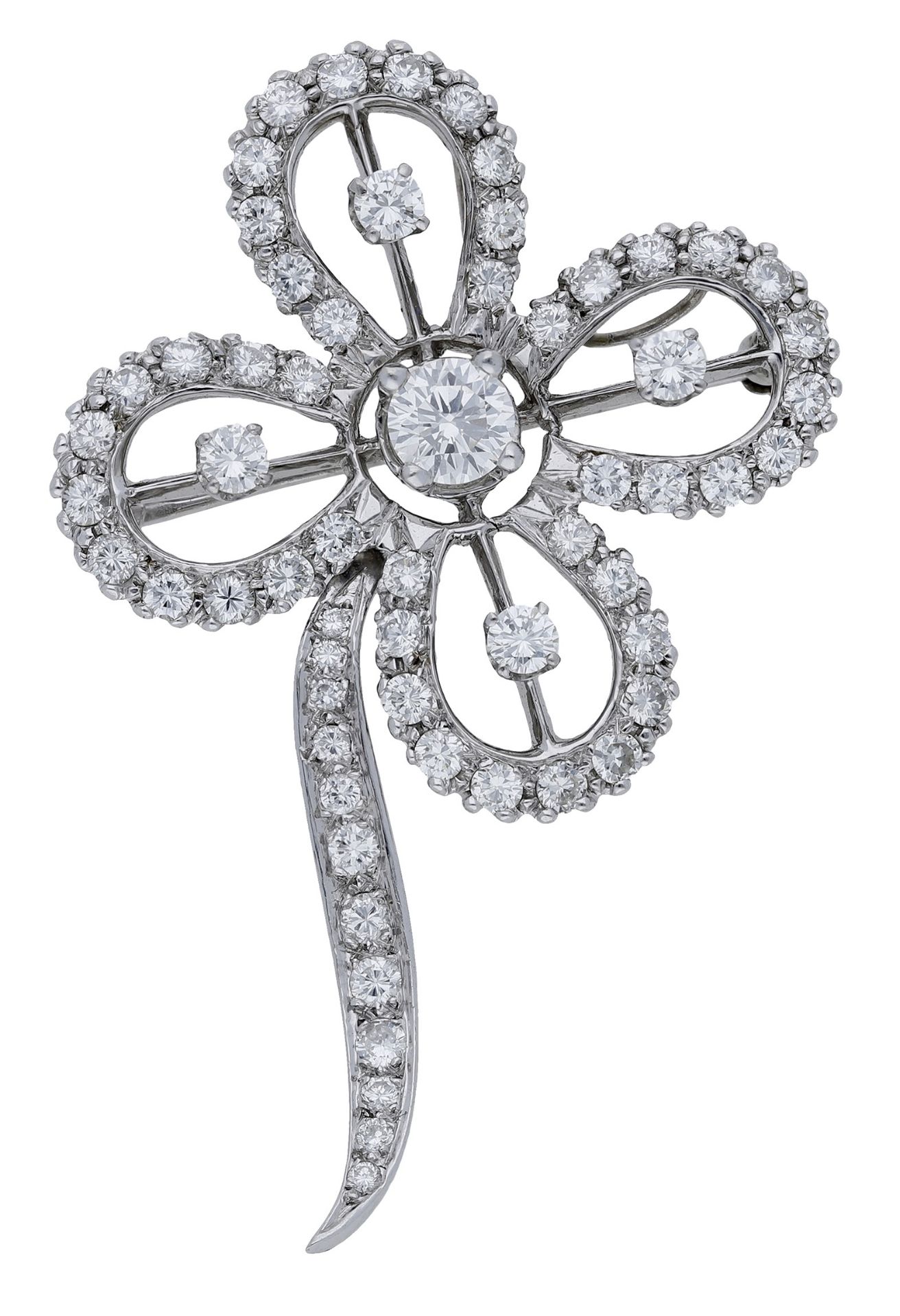 A diamond flower brooch/pendant, circa 1955, the stylised flower with knife-edge detailing a...